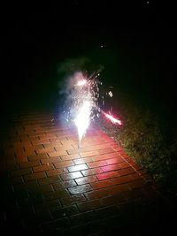 Firework display at night