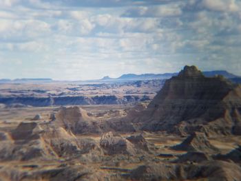 Scenic view of rock formations against sky