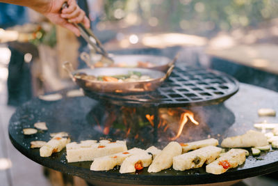 Close-up of meat cooking on barbecue grill