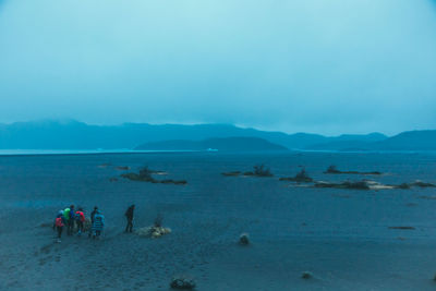 High angel view of people on land against sky