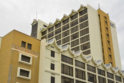 Low angle view of residential building against sky