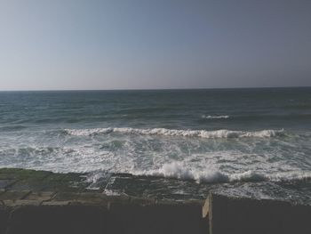 Scenic view of sea against clear sky