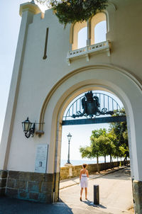 Man and woman outside building