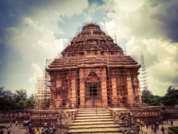 View of temple against cloudy sky