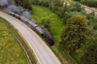 High angle view of train moving on road