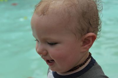 Close-up of cute boy in water