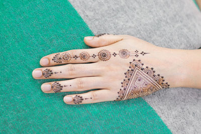 High angle view of woman hand