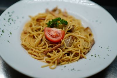 High angle view of noodles served in plate on table