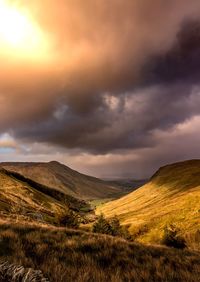 Scenic view of field against sky during sunset
