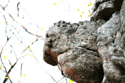 Low angle view of statue against sky