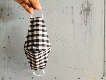 Midsection of woman holding umbrella