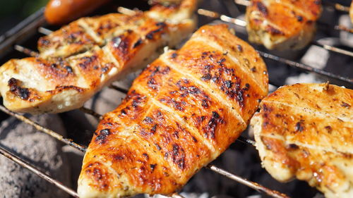 Close-up of meat on barbecue grill