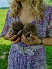 Dressed lady with baby cat's 