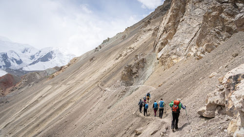 People walking on mountain