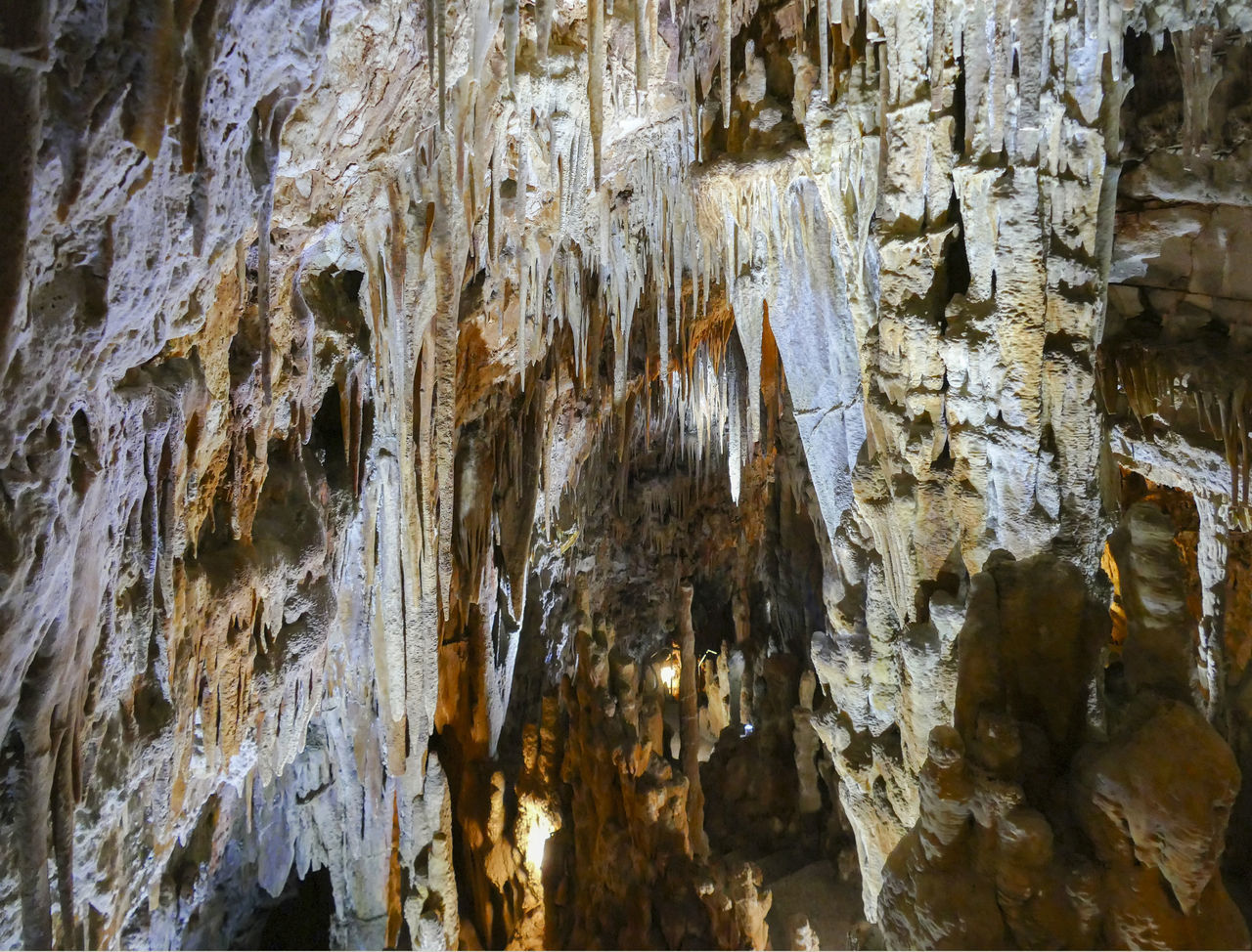 stalactite, rock, stalagmite, cave, no people, geology, speleothem, beauty in nature, nature, rock formation, physical geography, pattern, outdoors, day, limestone, textured, formation