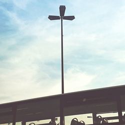 Low angle view of street light against sky