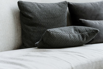 Close-up of sofa on bed