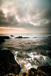 Scenic view of sea against sky during sunset