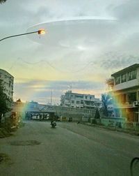 Cars on road against sky