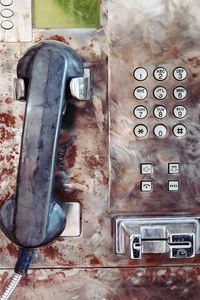 Close-up of old telephone booth