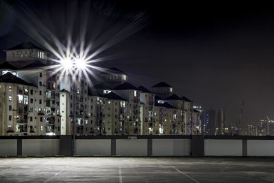 Illuminated street lights at night