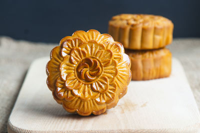 High angle view of moon cakes on cutting board