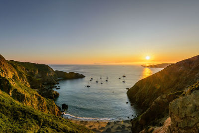 Scenic view of sea against sky during sunset