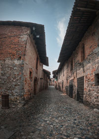 Narrow alley along buildings