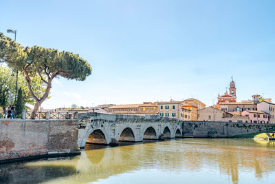 Bridge over river against sky