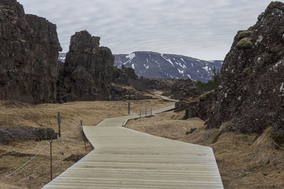 Perspective of the walkway among the volcanic rocks