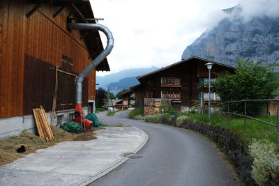 Street amidst buildings against sky