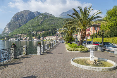 The beautiful promenade on the lakeside of menaggio with flower beds