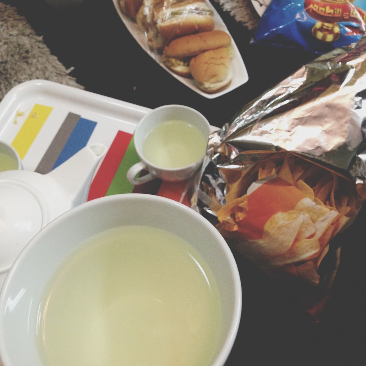 food and drink, indoors, drink, freshness, food, high angle view, table, still life, refreshment, coffee cup, plate, spoon, coffee - drink, healthy eating, directly above, bowl, breakfast, saucer, coffee, cup