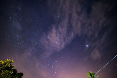 Low angle view of star field against sky at night