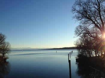 Scenic view of sea against clear blue sky