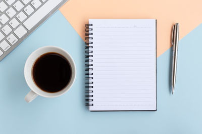 High angle view of coffee cup on table