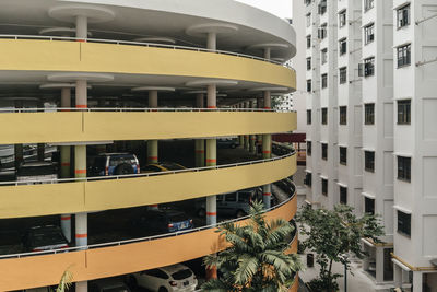 Cars parked at parking lot in city