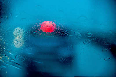 Full frame shot of wet windshield during rainy season