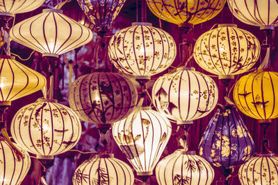 Low angle view of illuminated lanterns hanging in market