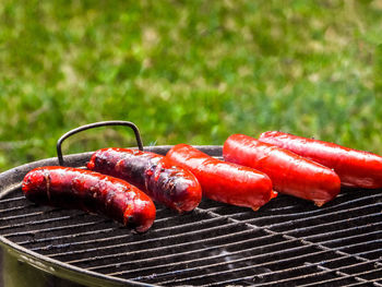 Close-up of meat on barbecue grill