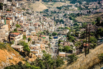 High angle view of residential buildings in city