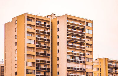 Low angle view of residential building against sky