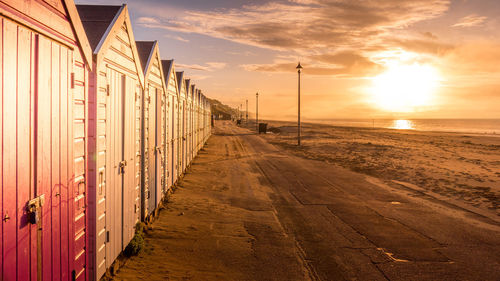 Beach huts on southbourne at sunrise