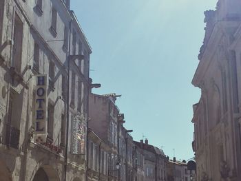 Low angle view of buildings against clear sky