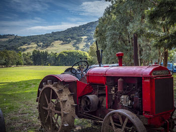 Bicycles on field against sky