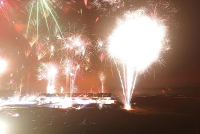 Firework display at night