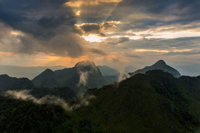 Scenic view of mountains against sky during sunset