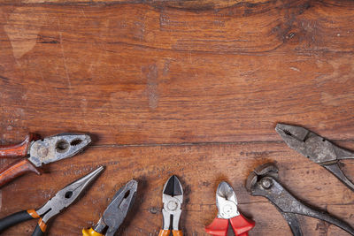 High angle view of shoes on wooden table