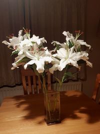 Close-up of flower vase on table