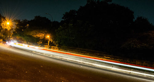 Light trails on street at night